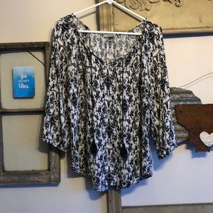 Light flowy blouse with ties/tassels at neck